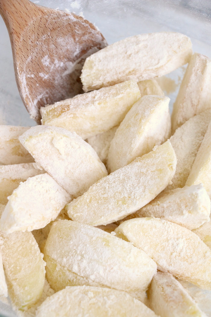 Apple wedges rolled in graham cracker crumbs