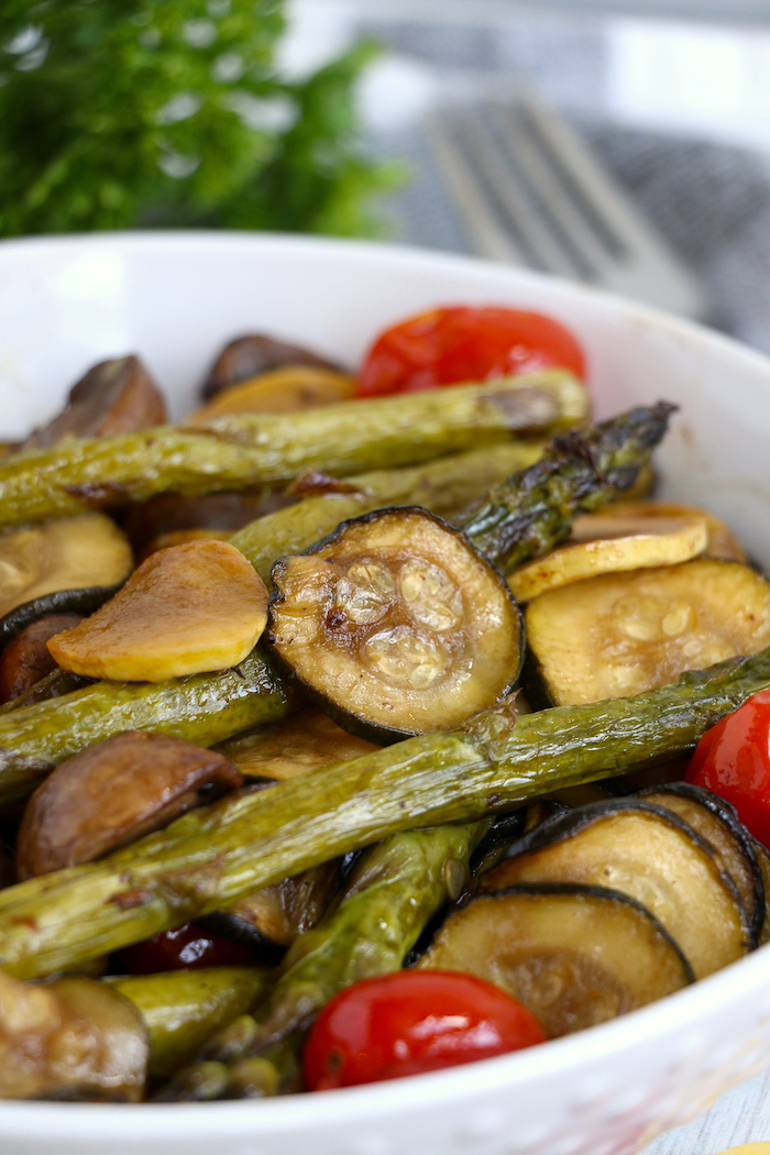 Roasted vegetables in a white dish