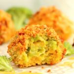 up close shot of the inside of a broccoli cheese ball