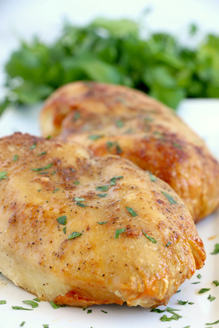 Air Fryer Chicken Breasts - Juicy and flavorful chicken breasts made right in the air fryer! Eat them on their own or add to salads, casseroles or other dishes!