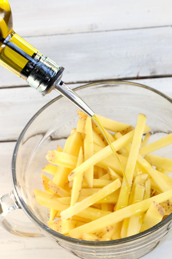 Air Fryer French Fries - Delicious hand cut fries made in the air fryer with 75% less fat than deep frying!