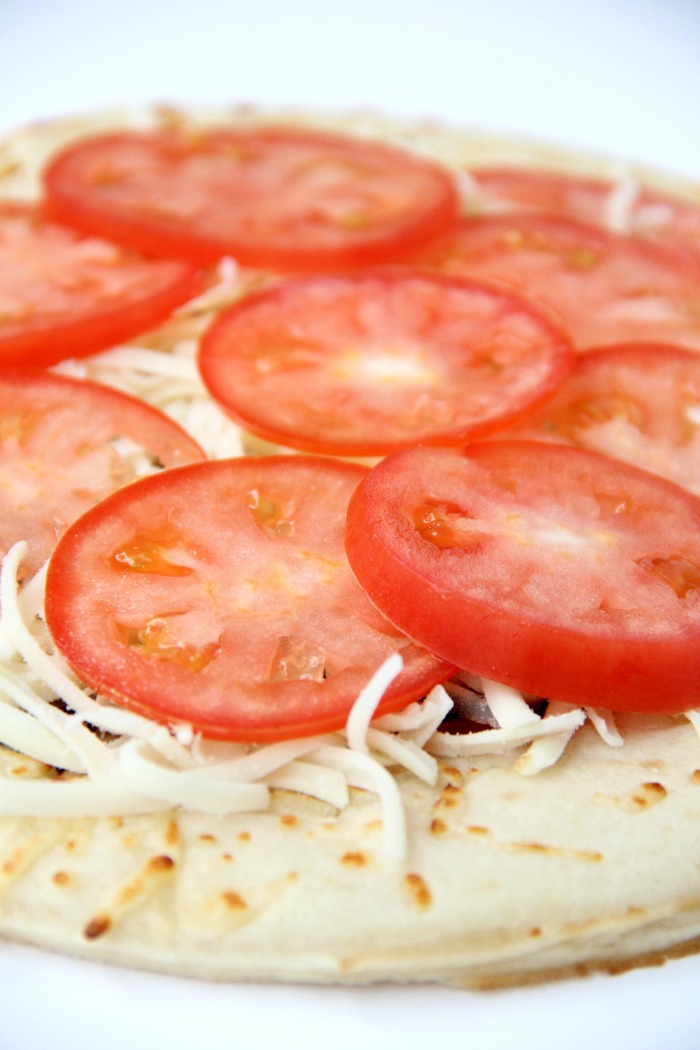 Air Fryer Pizza - Crispy and flavorful pizza baked right in the air fryer!