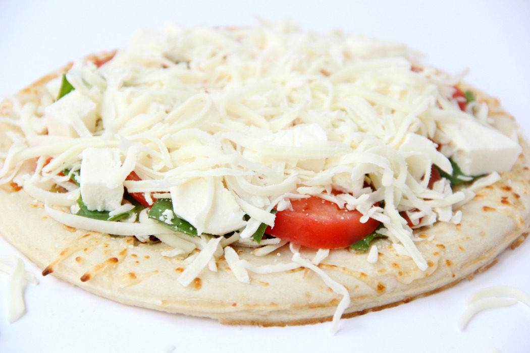 Air Fryer Pizza - Crispy and flavorful pizza baked right in the air fryer!