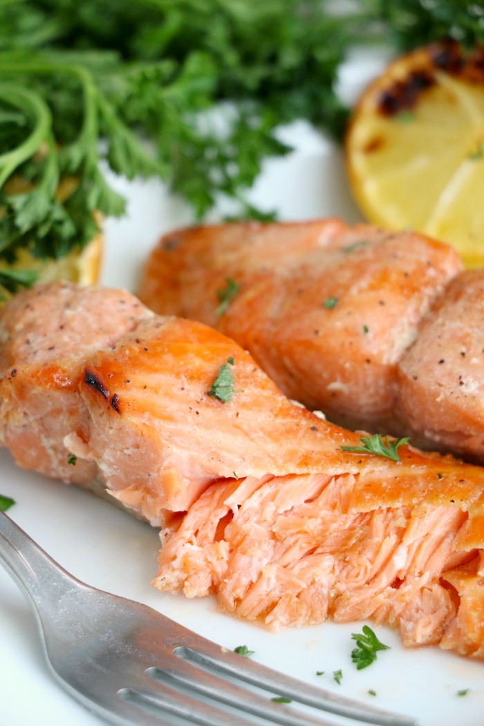 Cutting into piece of salmon