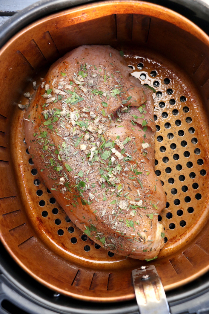 Air Fryer Turkey Breast - Garlic and fresh herb-seasoned turkey in the air fryer - moist and juicy on the inside with a crispy, golden brown skin on the outside.