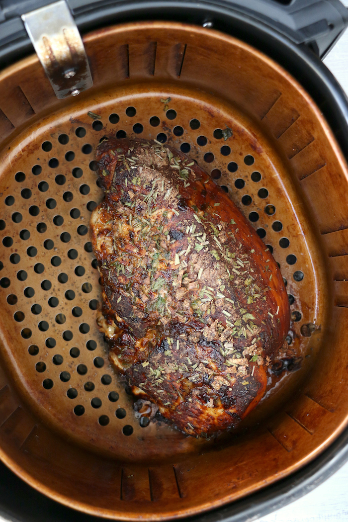 Air Fryer Turkey Breast - Garlic and fresh herb-seasoned turkey in the air fryer - moist and juicy on the inside with a crispy, golden brown skin on the outside.