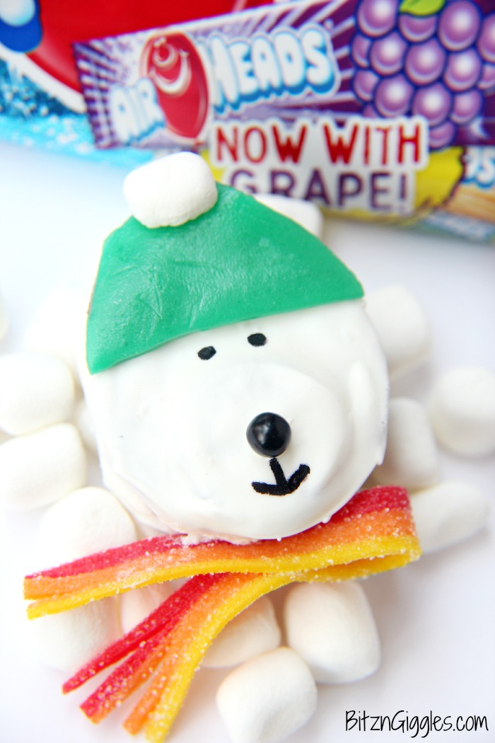 Polar Bear Cookie Treats - Confectionary coating and delicious accessories keep these cute little sandwich cookie bears warm and ready to bring smiles and laughter to dessert time!