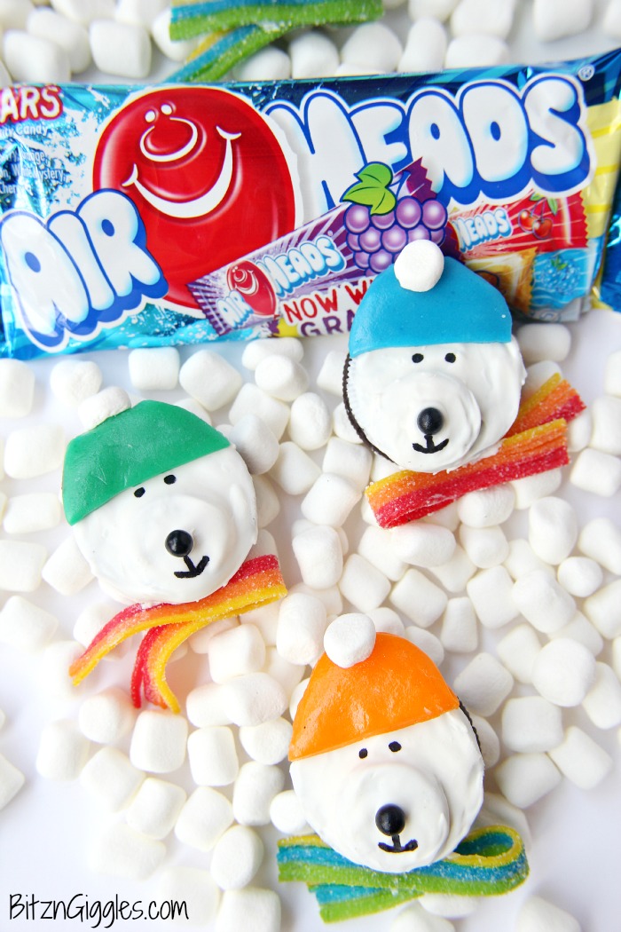 Polar Bear Cookie Treats - Confectionary coating and delicious accessories keep these cute little sandwich cookie bears warm and ready to bring smiles and laughter to dessert time!