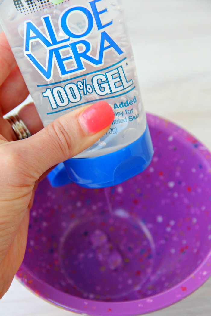 Squeezing aloe vera gel into a bowl