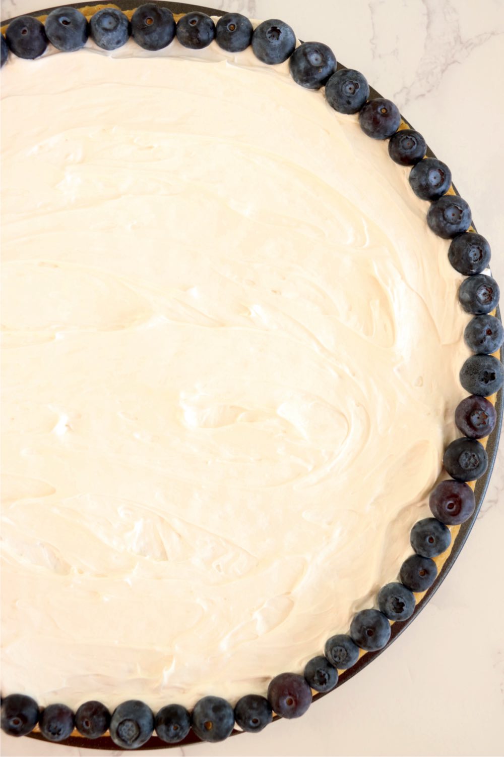 fresh blueberry border around a fruit pizza