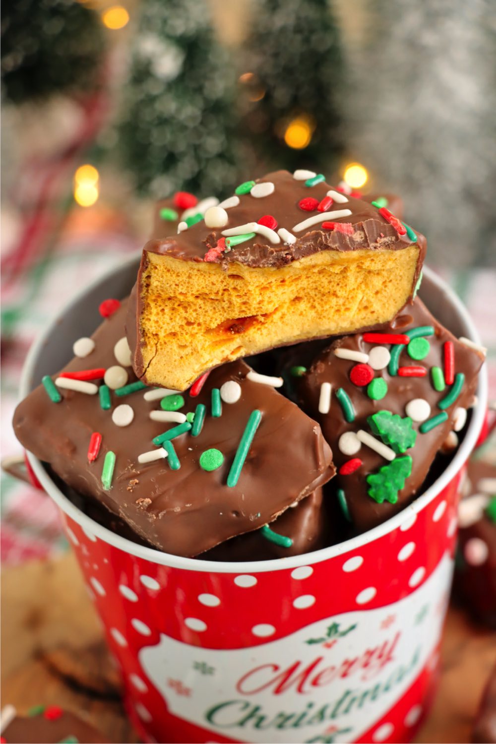 Christmas themed tin filled with honeycomb candy