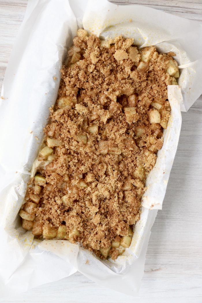 Cinnamon sugar mixture on top of fresh apple bread