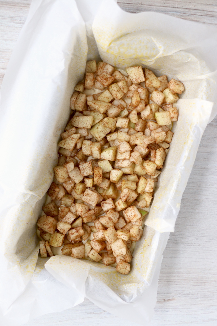 chopped apples in bread pan