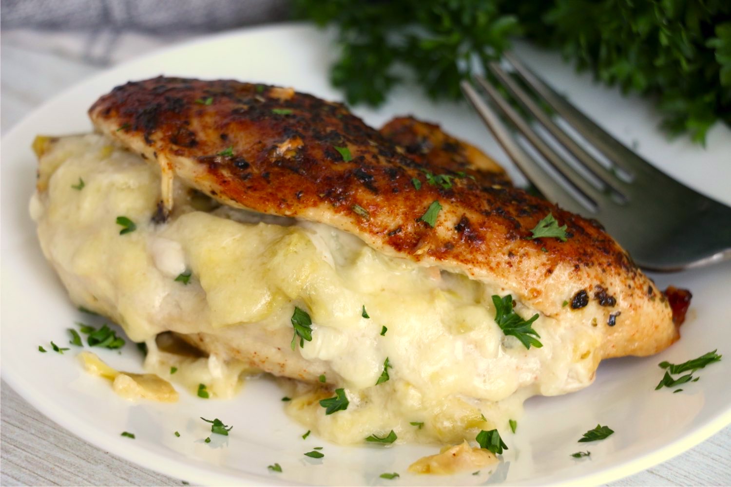 Chicken breast stuffed with a cheesy artichoke filling