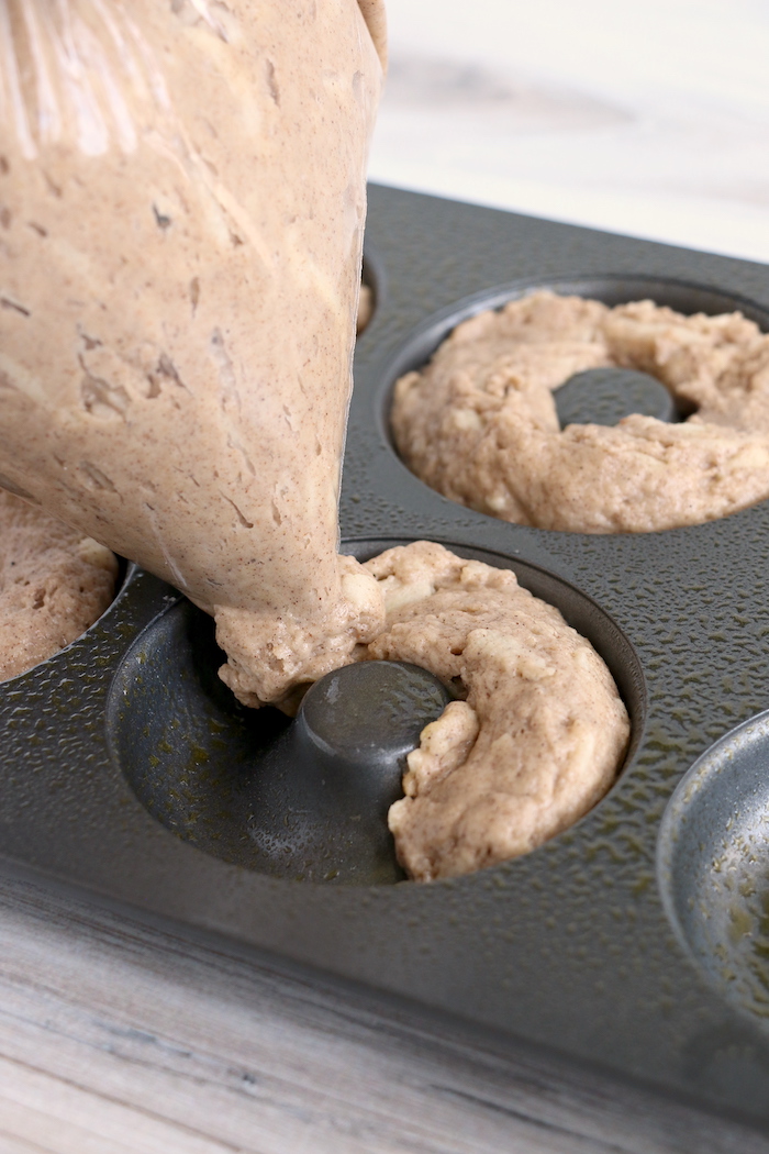 Piping batter into donut pan