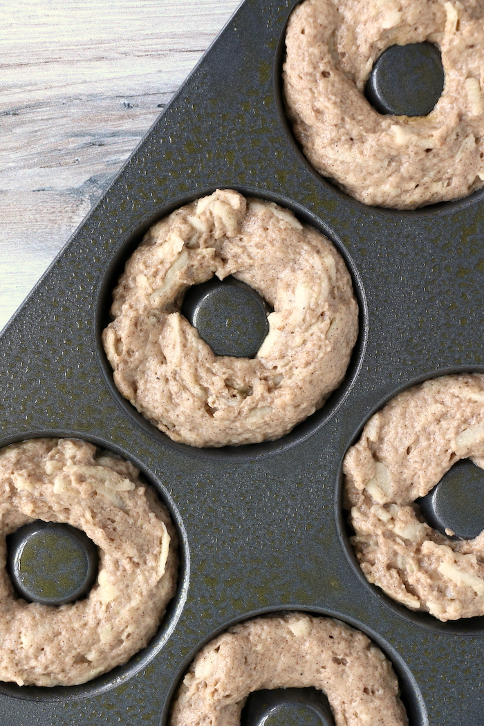 Unbaked donuts ready to go into oven