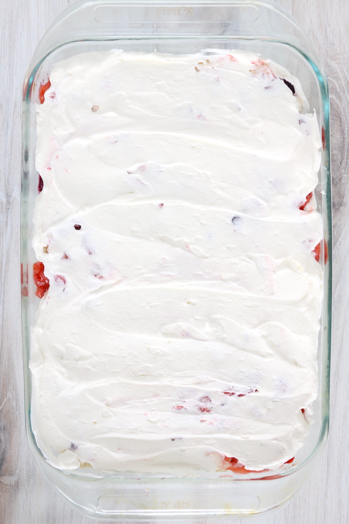 whipped topping on top of dessert in pan