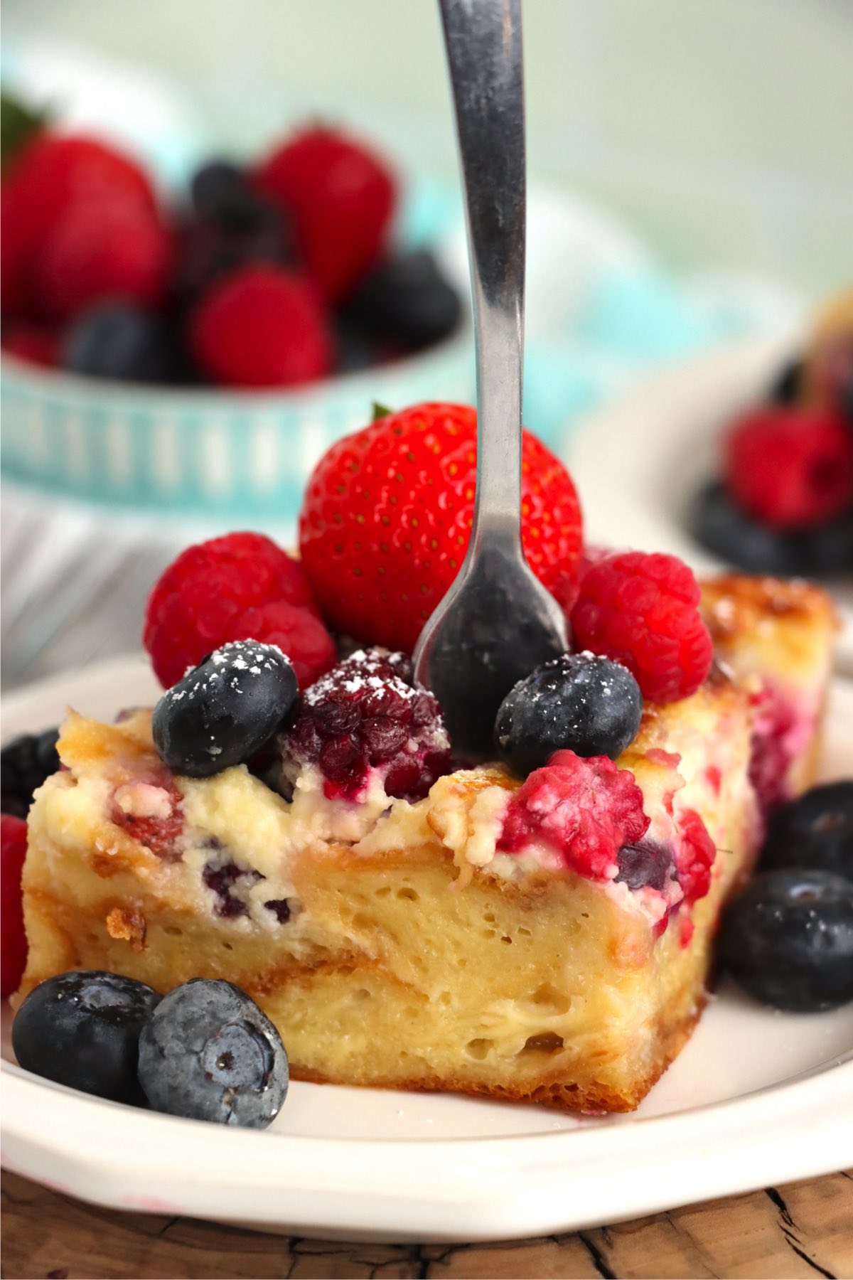fork going into a piece of croissant berry bake