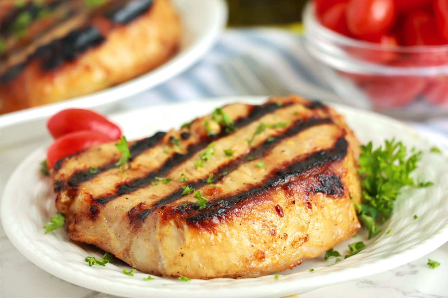 grilled pork chop on a plate