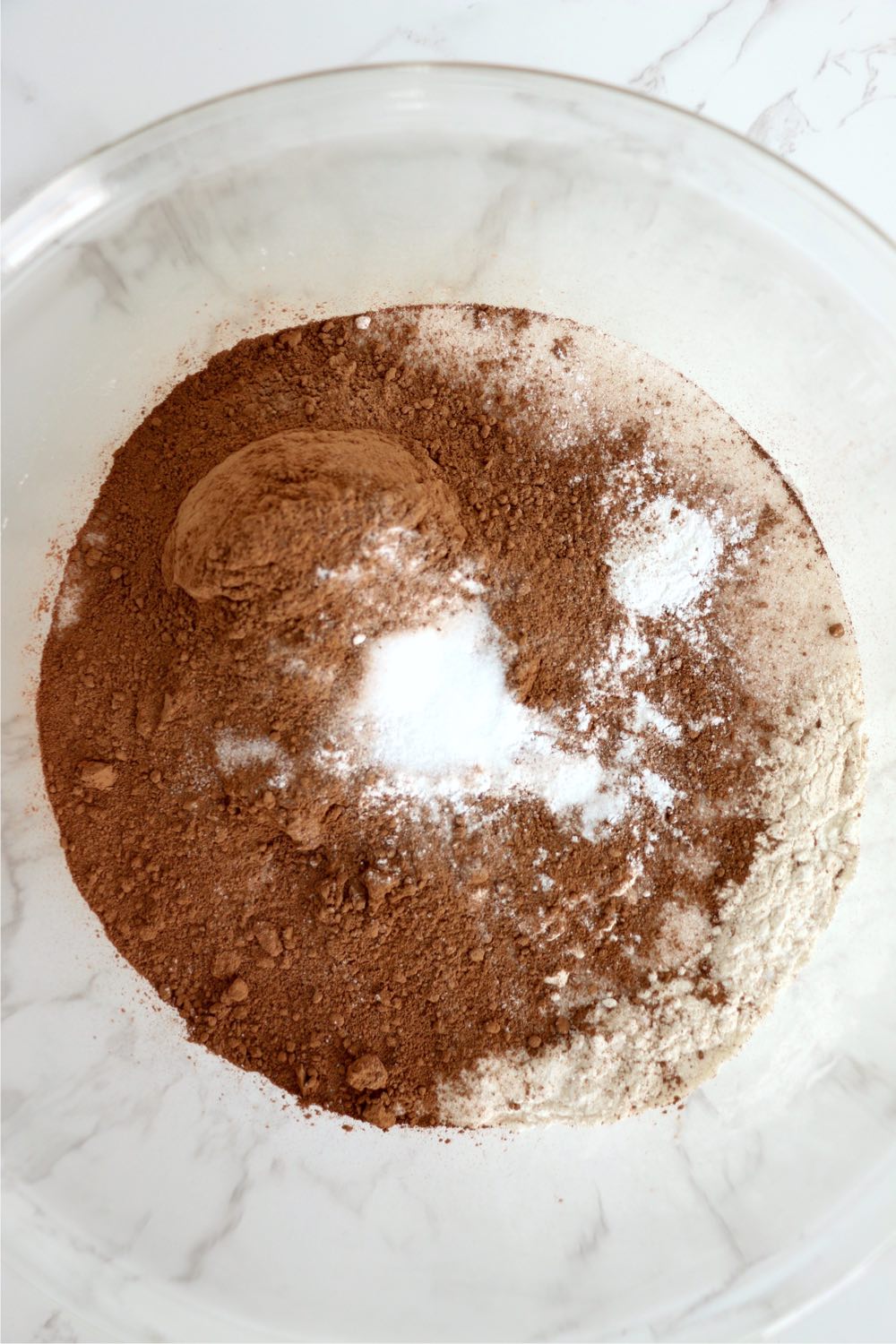 bowl with ingredients for chocolate cake