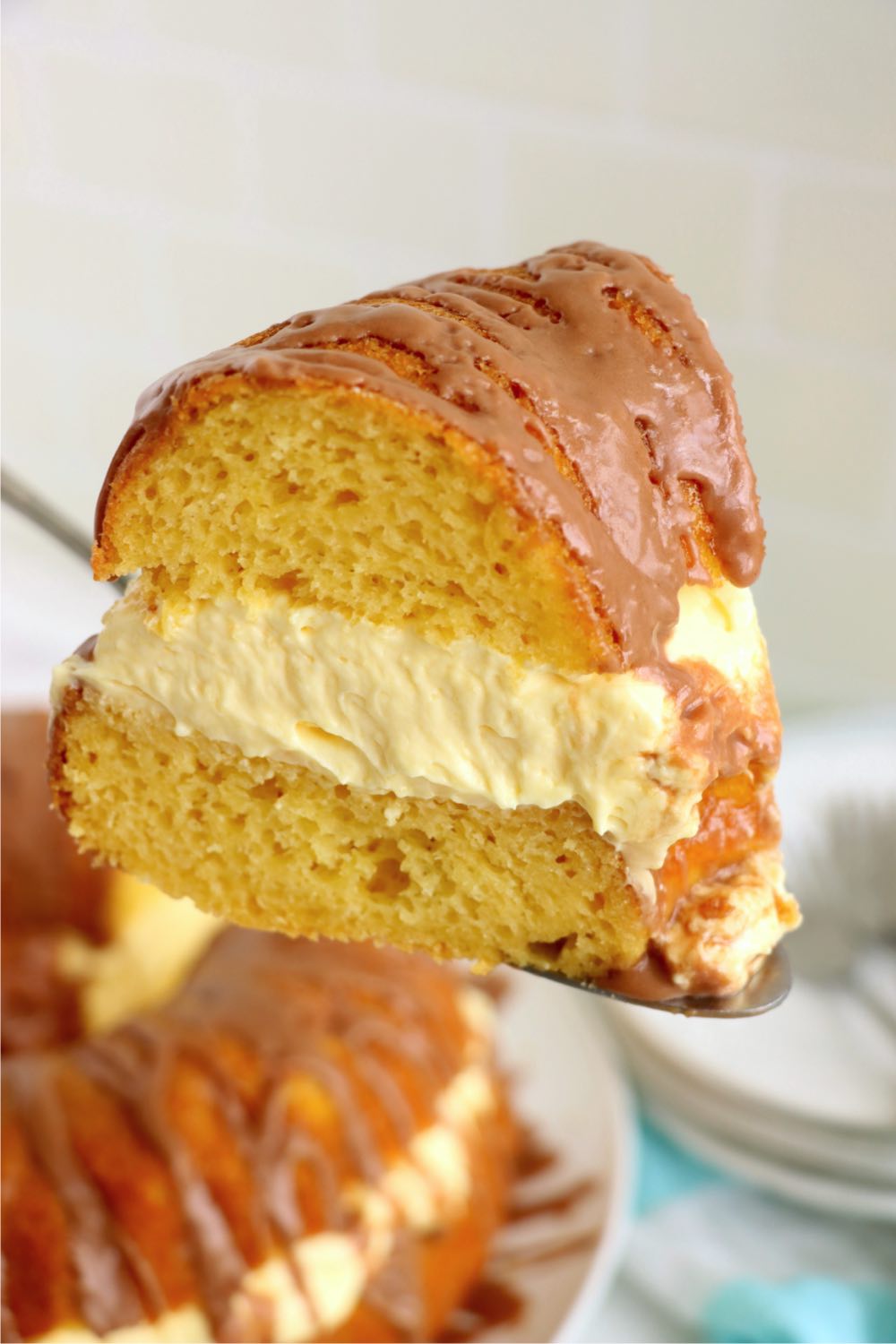 piece of boston cream cake on spatula