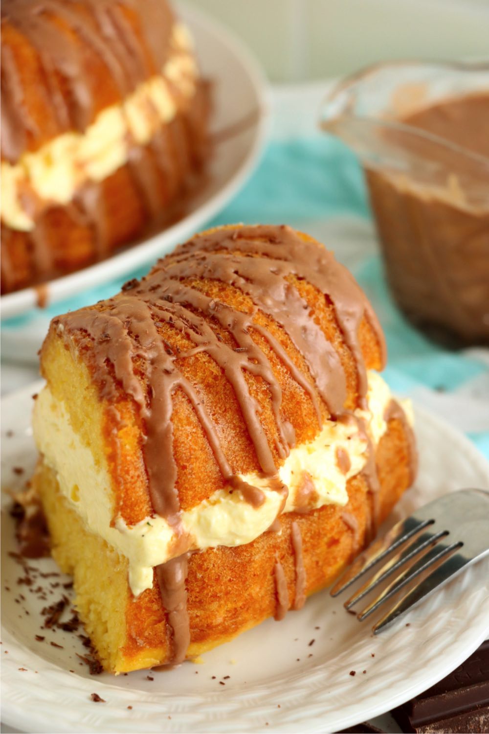 piece of buttery bundt cake with chocolate glaze