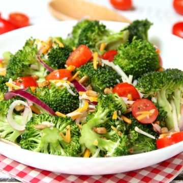 Broccoli and Tomato Salad - Sweet grape tomatoes, red onion, broccoli, cheese and sunflower seeds drizzled with a tangy raspberry vinaigrette.