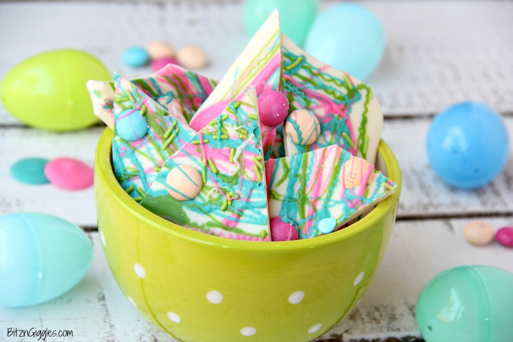 Drizzled Candy Bark - A fun twist on traditional candy bark with M&Ms, sprinkles and colored candy coating drizzle! Perfect for spring and Easter!