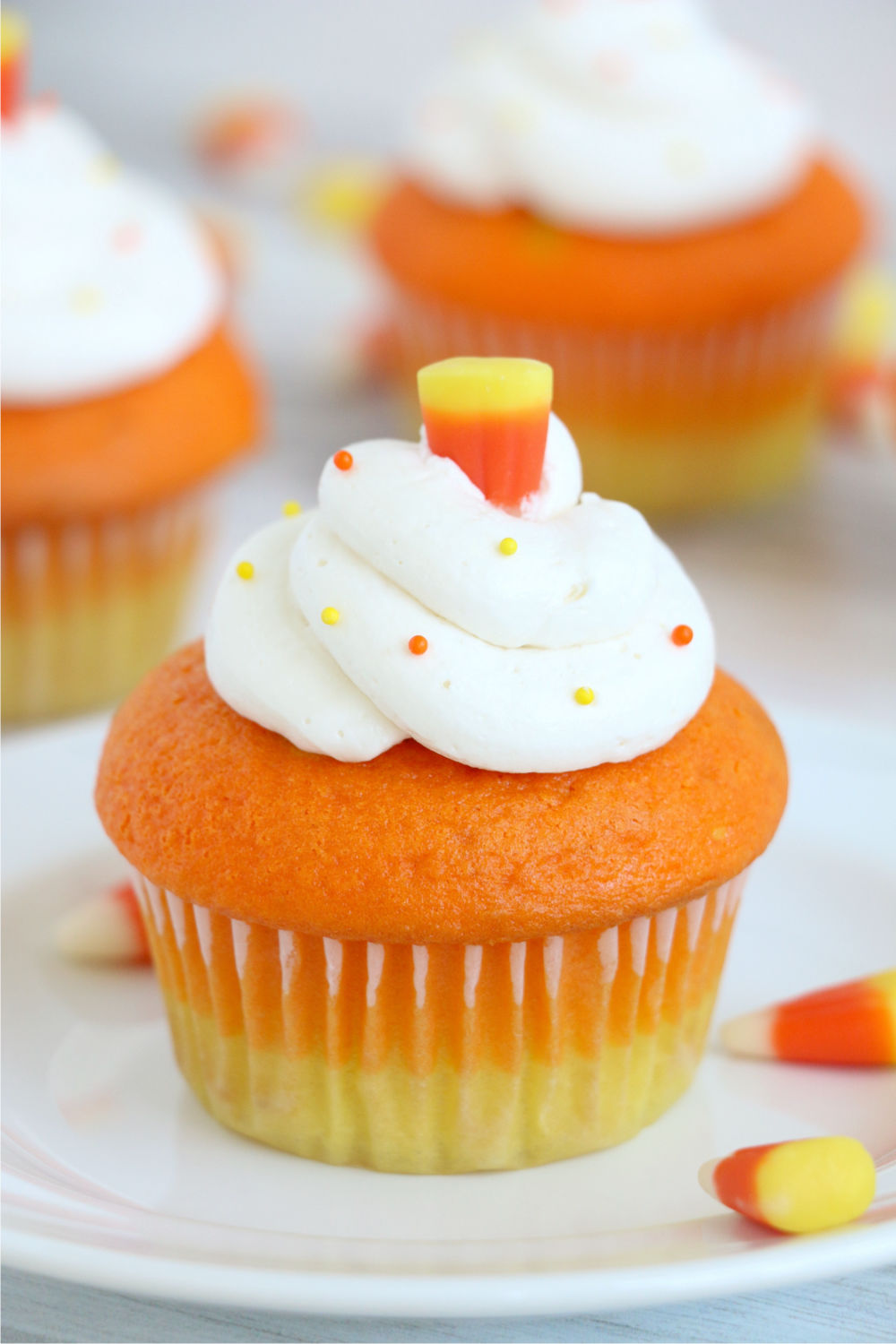 Candy corn cupcakes with candy corn on top