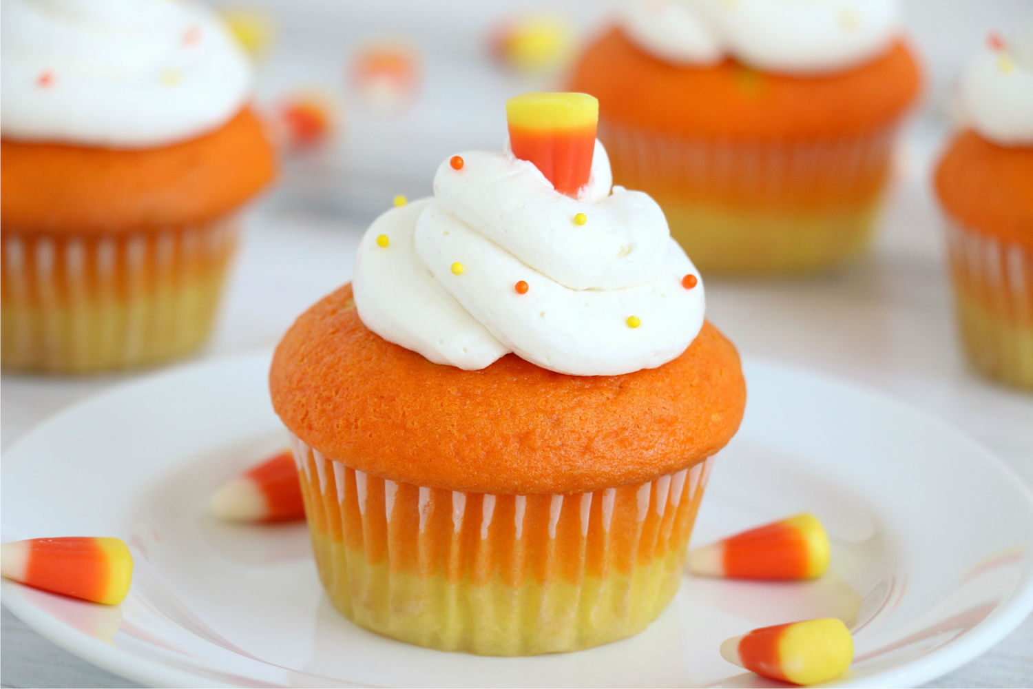 cupcake decorated like candy corn