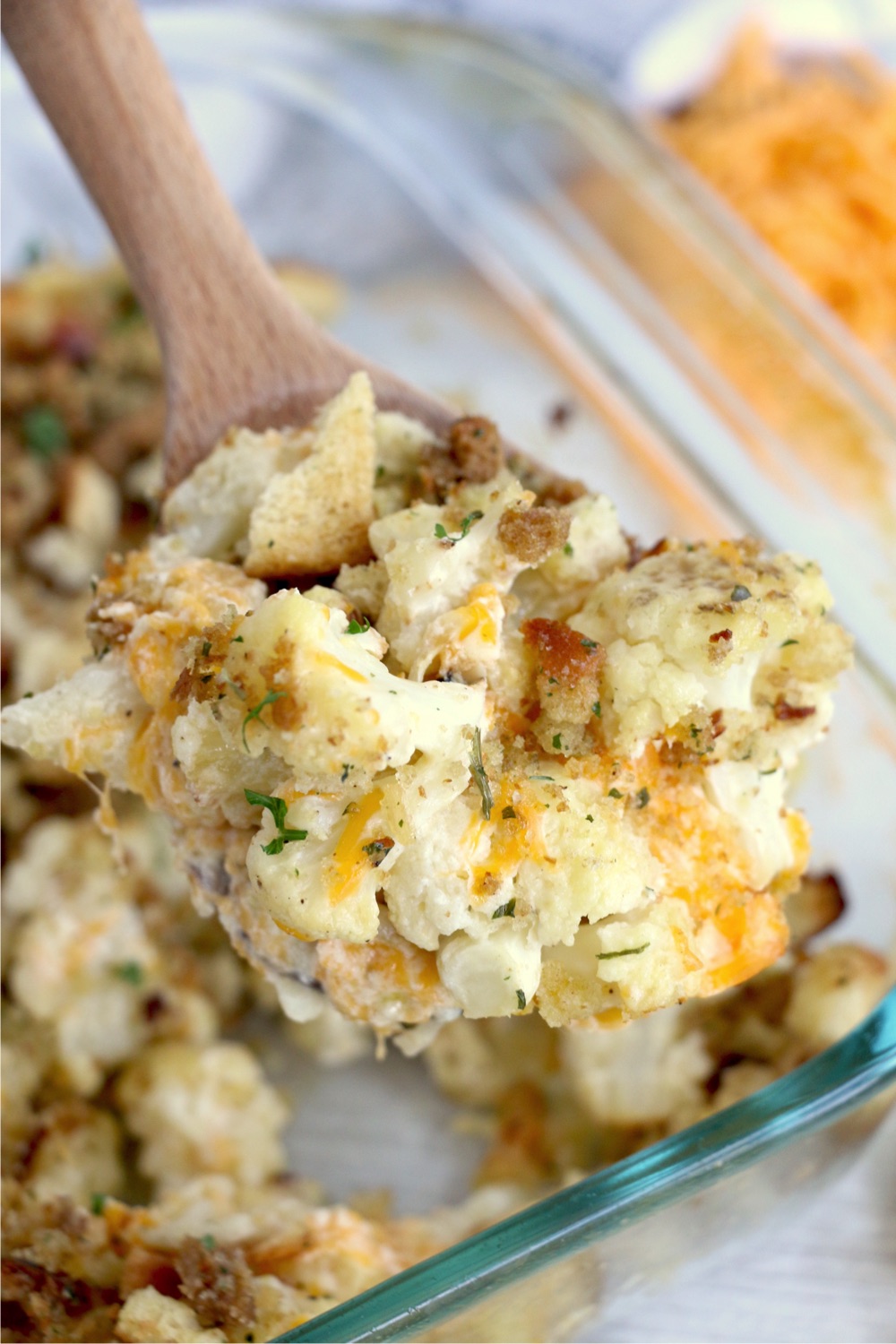 wooden spoonful of cauliflower casserole