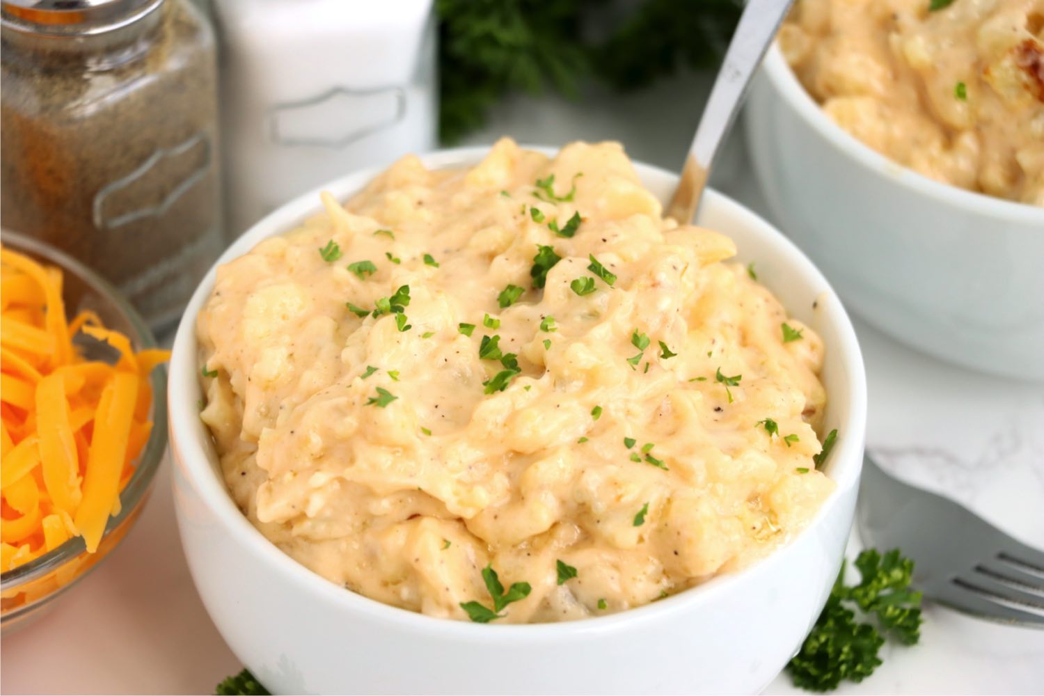 bowl of macaroni and cheese made with cauliflower instead of noodle