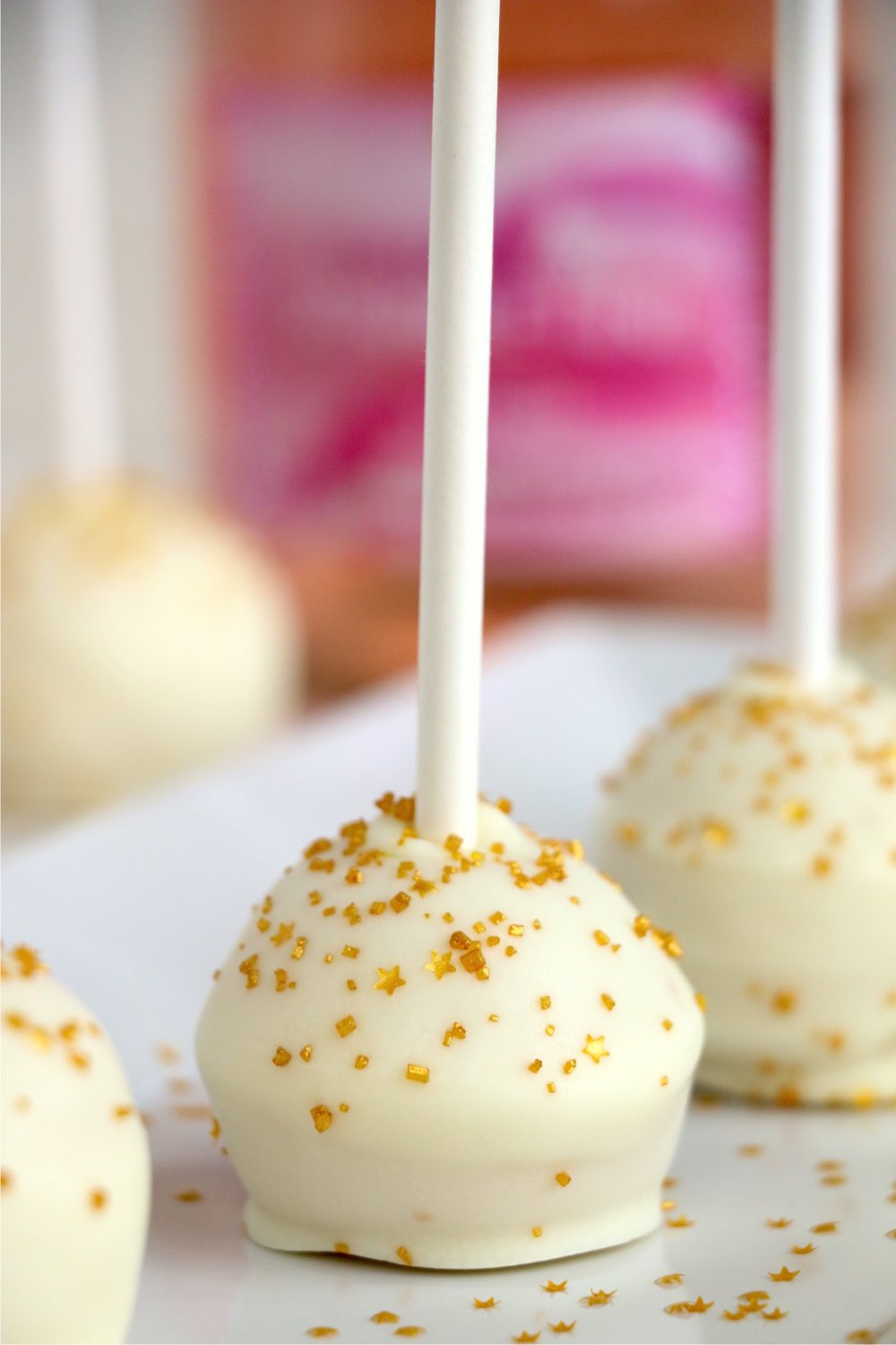 white plate with cake pops