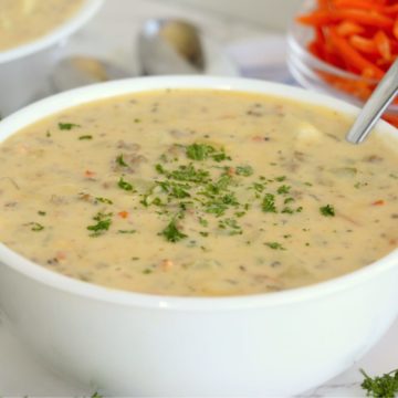 bowl of cheeseburger soup with parsley garnish