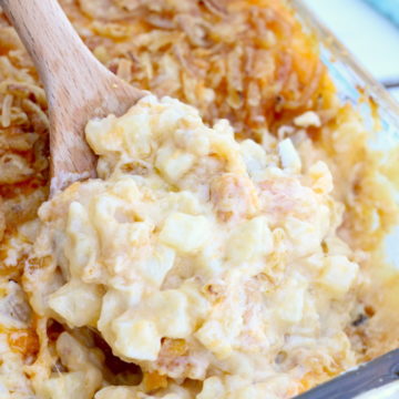 Cheesy Hashbrown Potatoes - Cheesy potato casserole topped with crunchy French fried onions! One of the best hash brown casserole recipes out there!