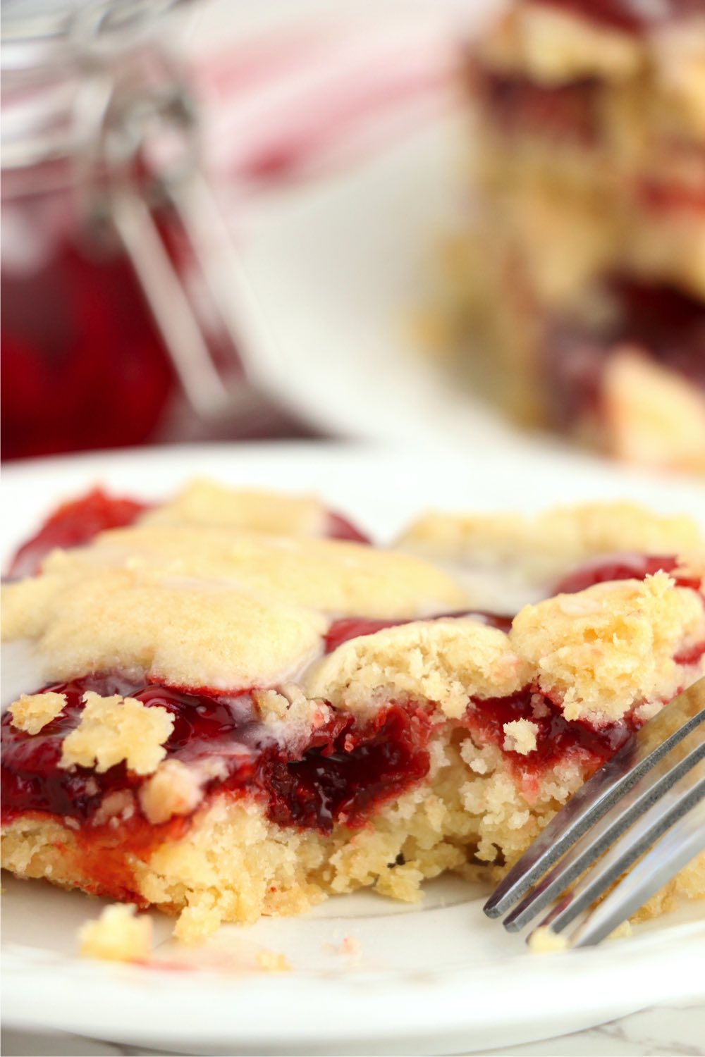 fork digging into a cherry kuchen bar
