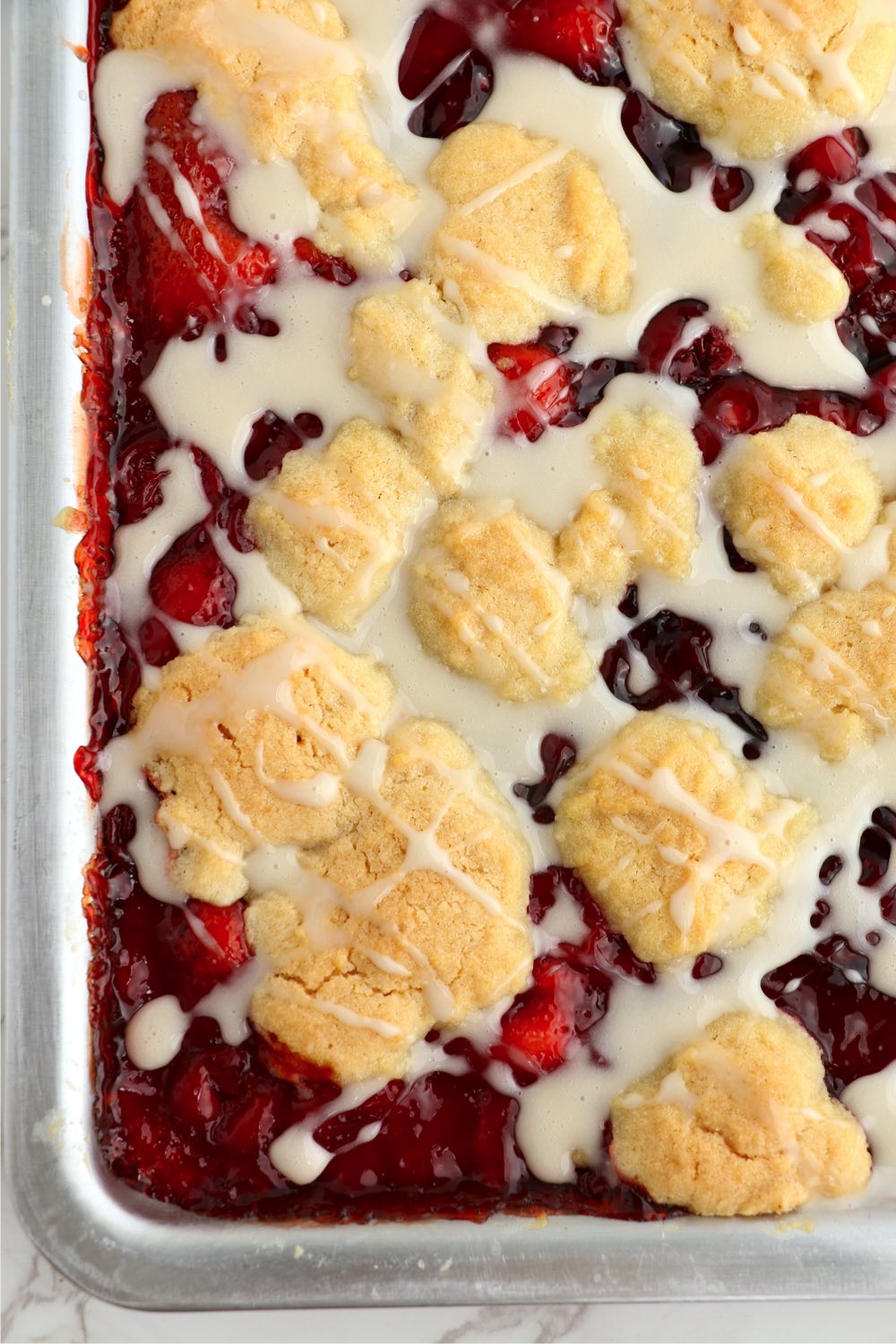 icing drizzled on cherry kuchen bars