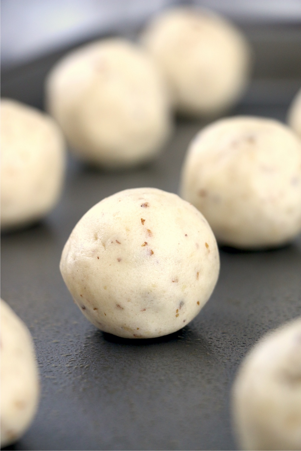 snowball cookies on baking sheet