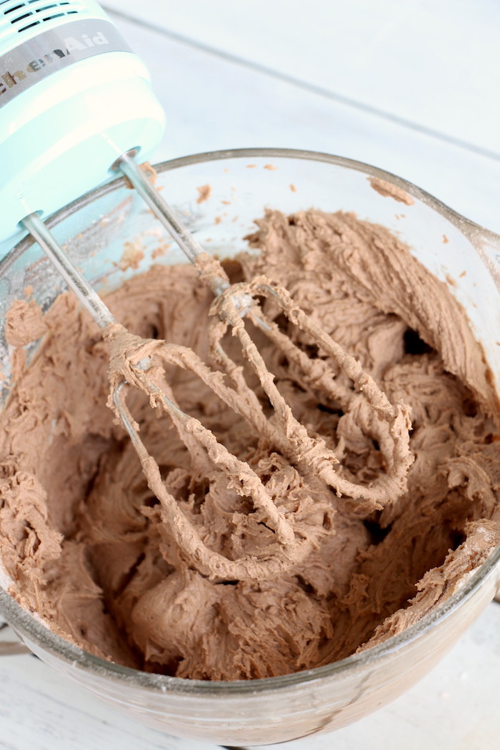 Zucchini Cake - Rich and moist chocolate zucchini cake topped with chocolate peanut butter frosting.