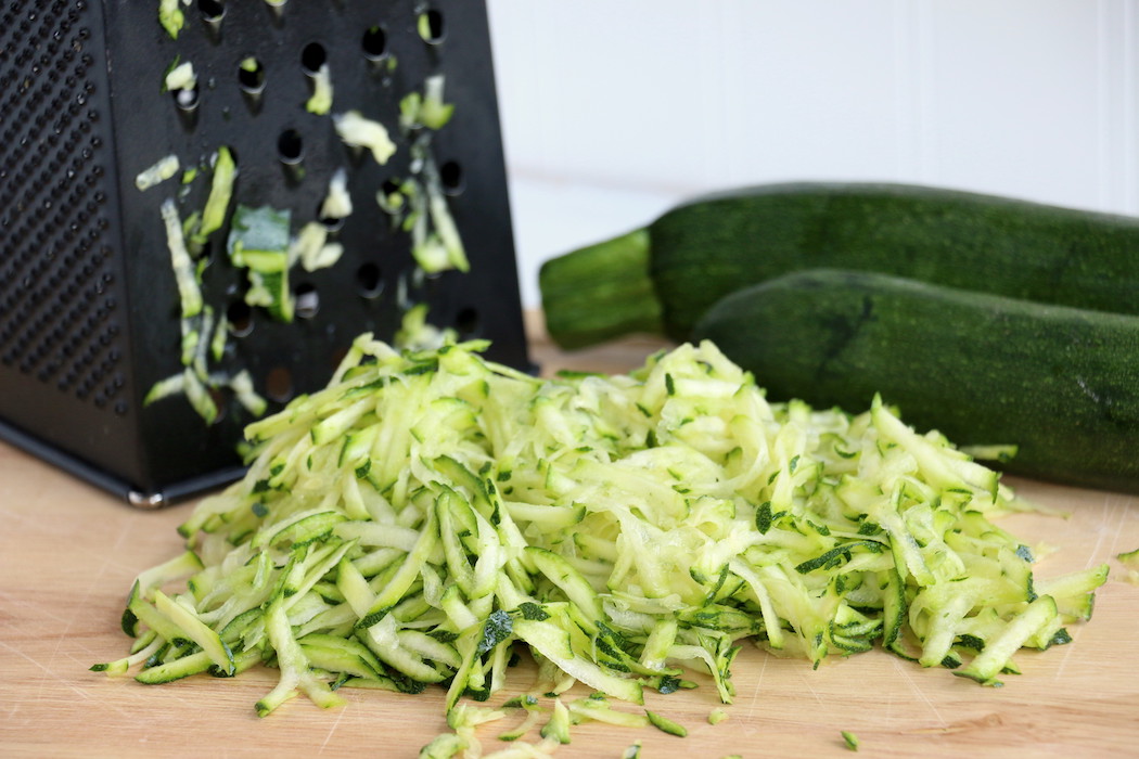 Zucchini Cake - Rich and moist chocolate zucchini cake topped with chocolate peanut butter frosting.