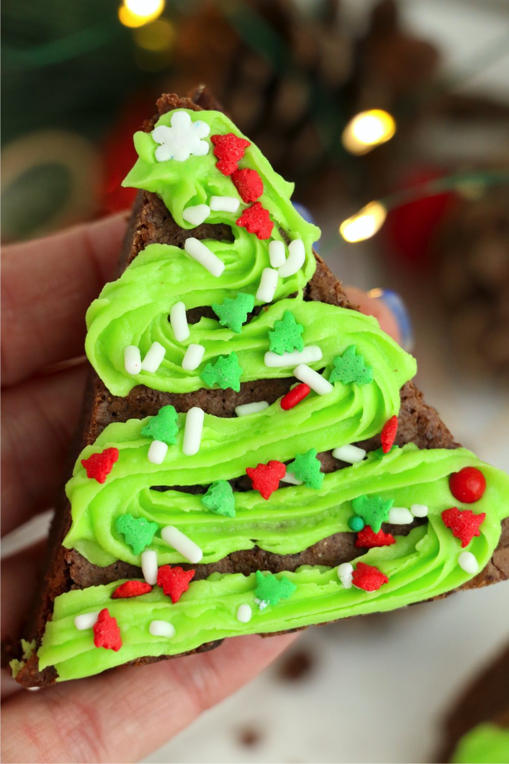 hand holding Christmas tree brownie