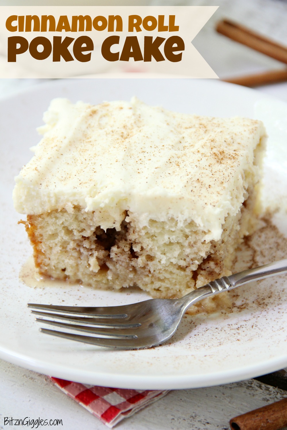 Cinnamon Roll Poke Cake - A soft and moist poke cake filled with a sweet cinnamon filling and topped with a homemade cream cheese frosting that melts in your mouth.