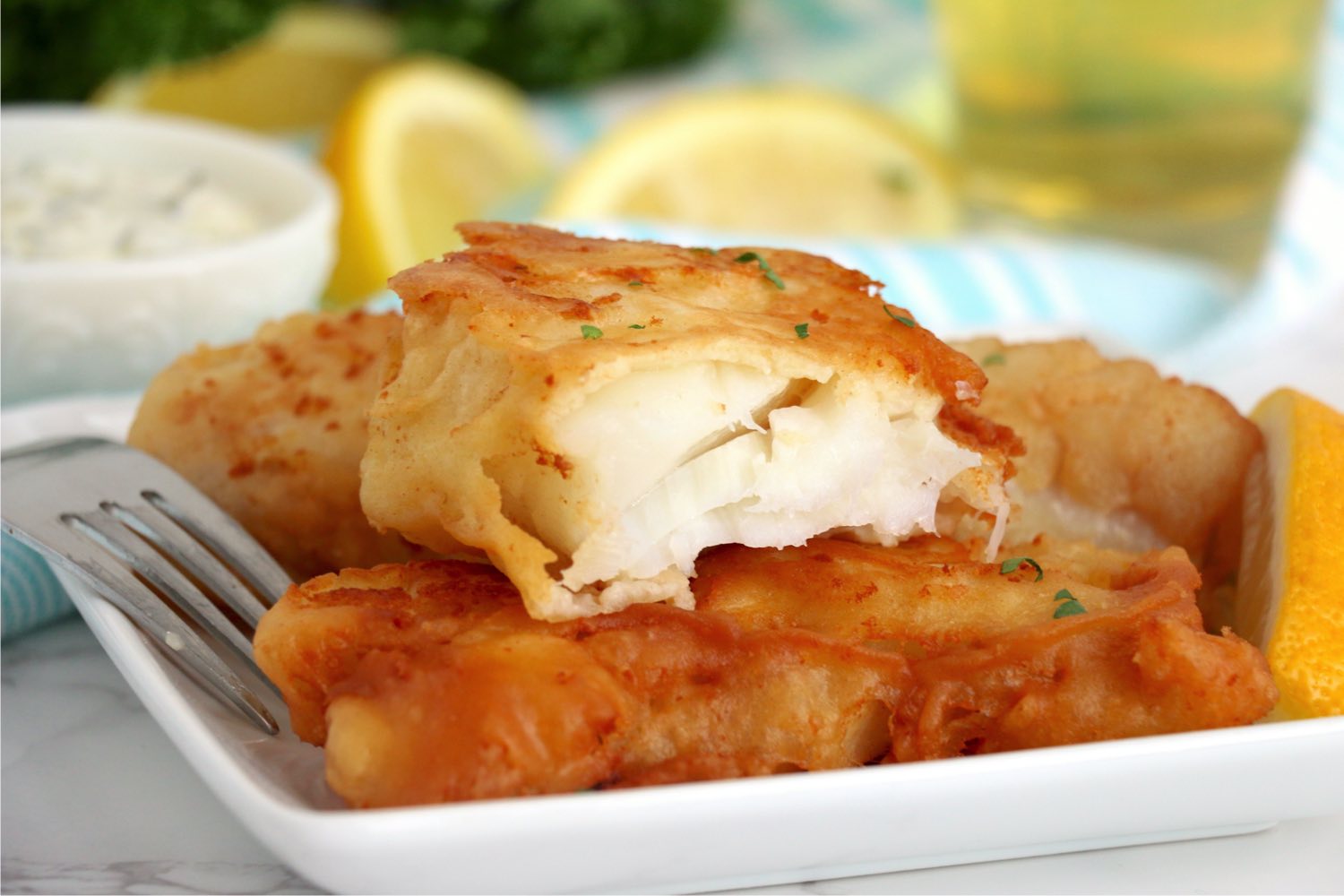 half eaten fish fillet on a plate