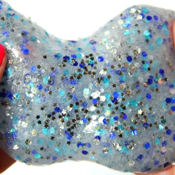 Clear Confetti Slime - Easy recipe for clear slime! Add confetti and foil stars to give it color and make it sparkle. So pretty!