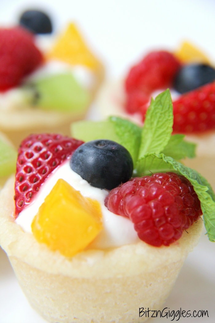 Sugar Cookie Fruit Cups - A bite-sized sugar cookie cup topped with fresh fruit, perfect for parties and gatherings!