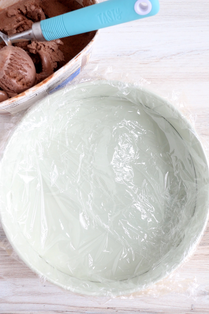 plastic wrap lined white baking dish
