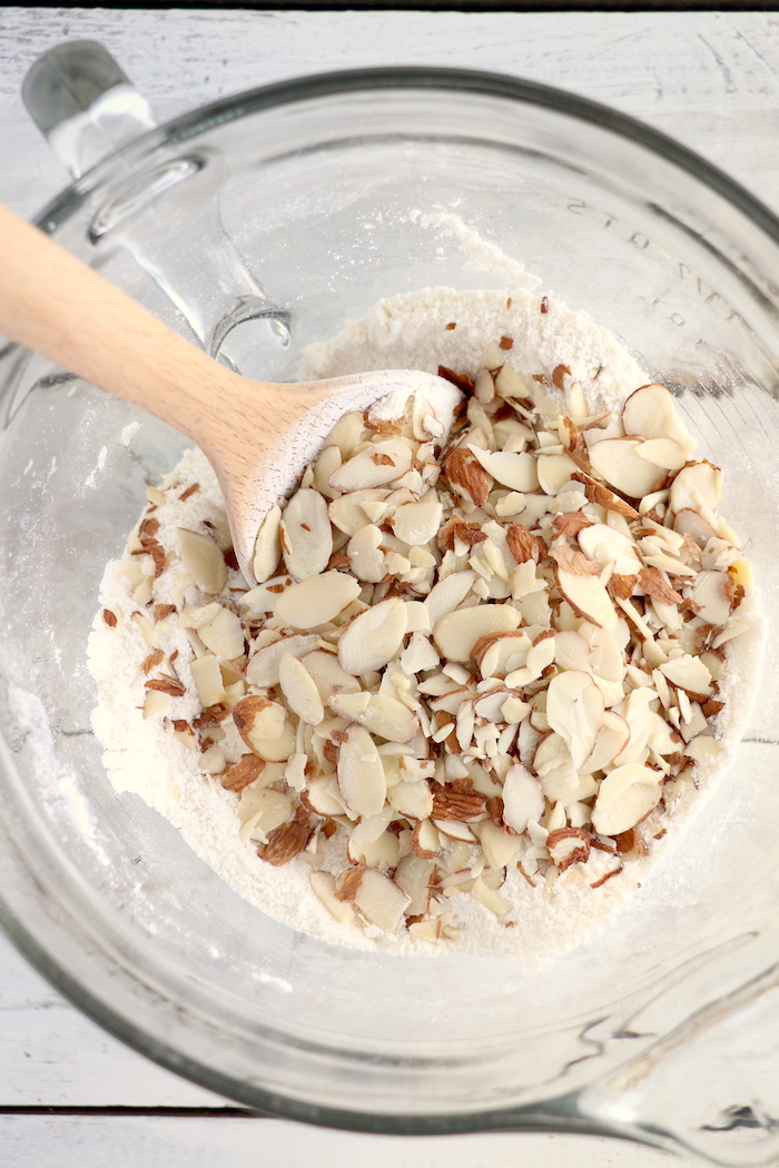 Easy Cranberry Cake - An easy and delicious cake bursting with tart cranberries. Top with vanilla ice cream and enjoy!