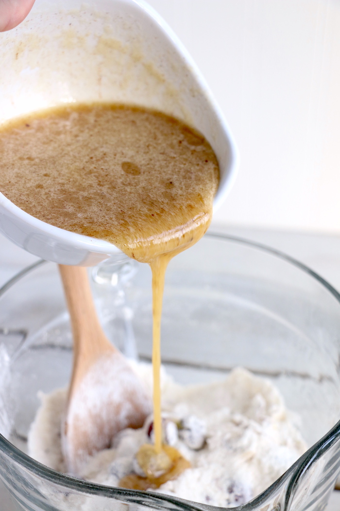 Easy Cranberry Cake - An easy and delicious cake bursting with tart cranberries. Top with vanilla ice cream and enjoy!