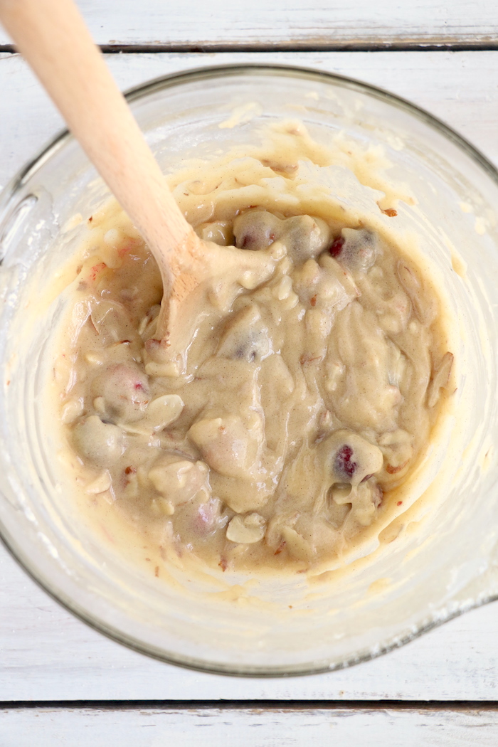 Easy Cranberry Cake - An easy and delicious cake bursting with tart cranberries. Top with vanilla ice cream and enjoy!