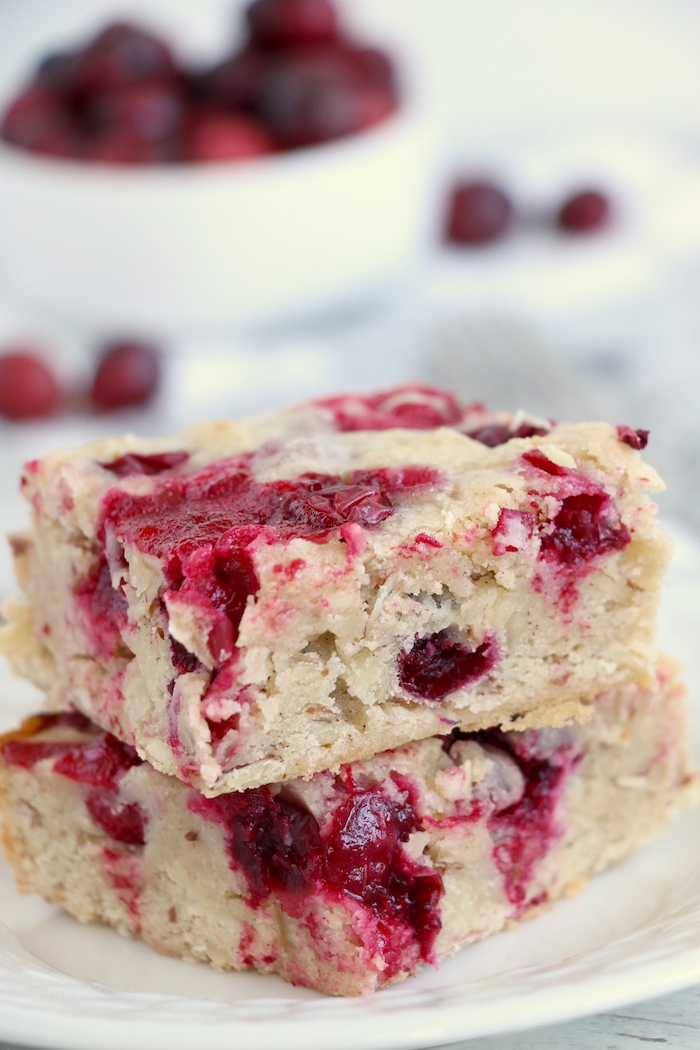 Easy Cranberry Cake - An easy and delicious cake bursting with tart cranberries. Top with vanilla ice cream and enjoy!